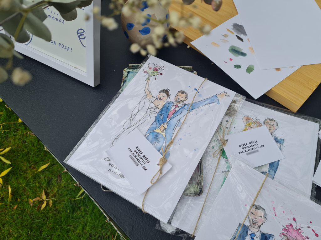 Detalle del stand esterior de Live Art en Finca Prados Moros. Acuarela de estilo fresco y natural realizada por Minea Masiá durante un evento, capturando el movimiento y la energía del momento. Acuarela de los novios, ideas bodas